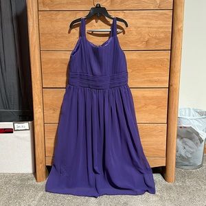 Size 14 young lady dress. Purple with a half zip in the back. Never worn.